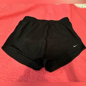 Women’s all black Nike athletic shorts